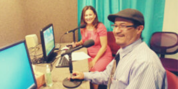 Rosana sitting in studio with a guest